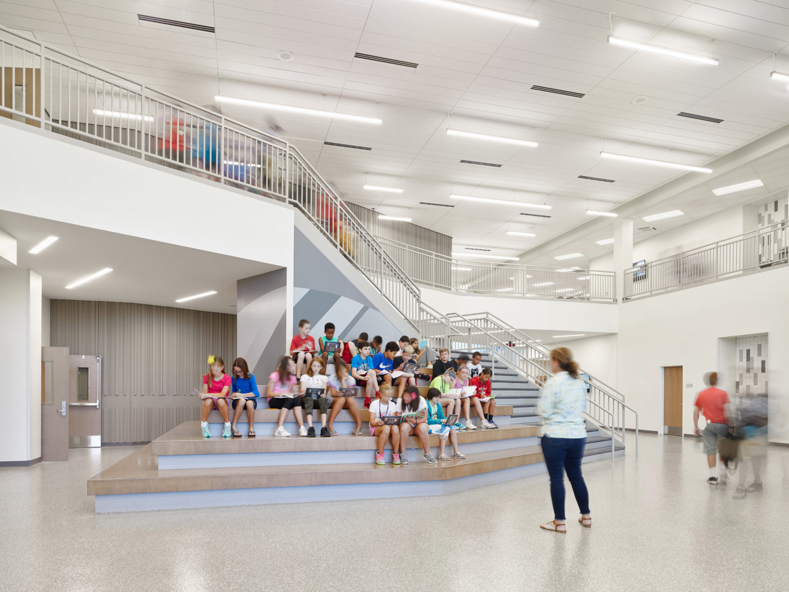 Students learning on learning stairs at Olathe USD 233 Summit Trail Middle School