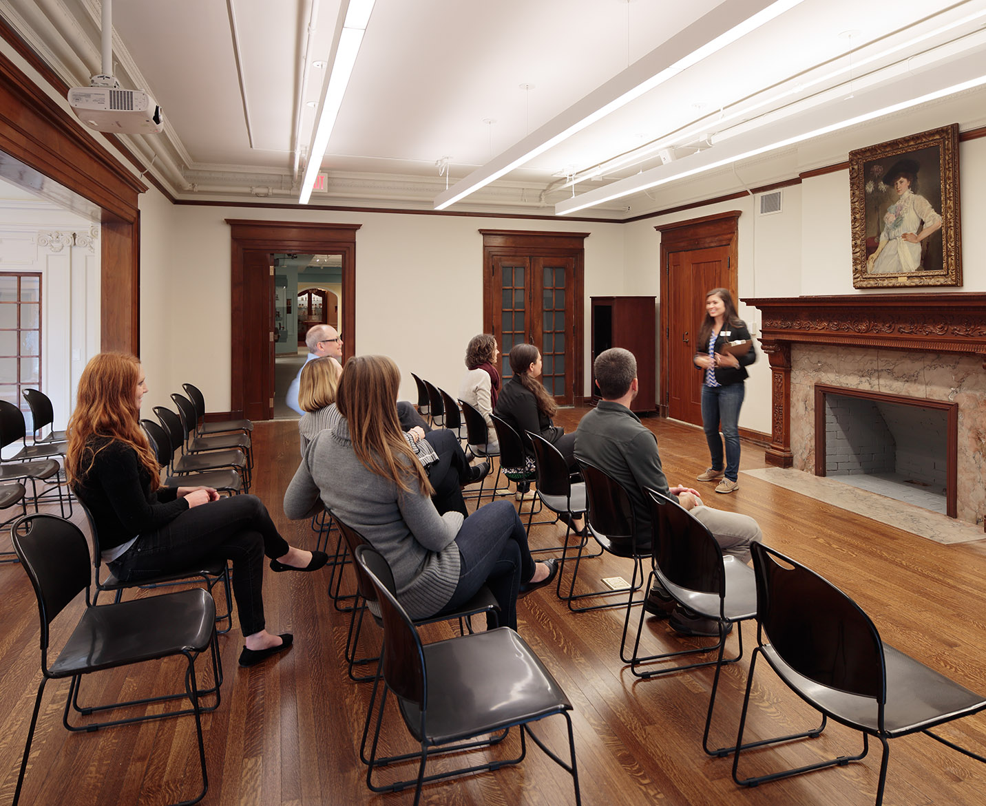 People in a meeting room at the National Museum of Toys and Miniatures