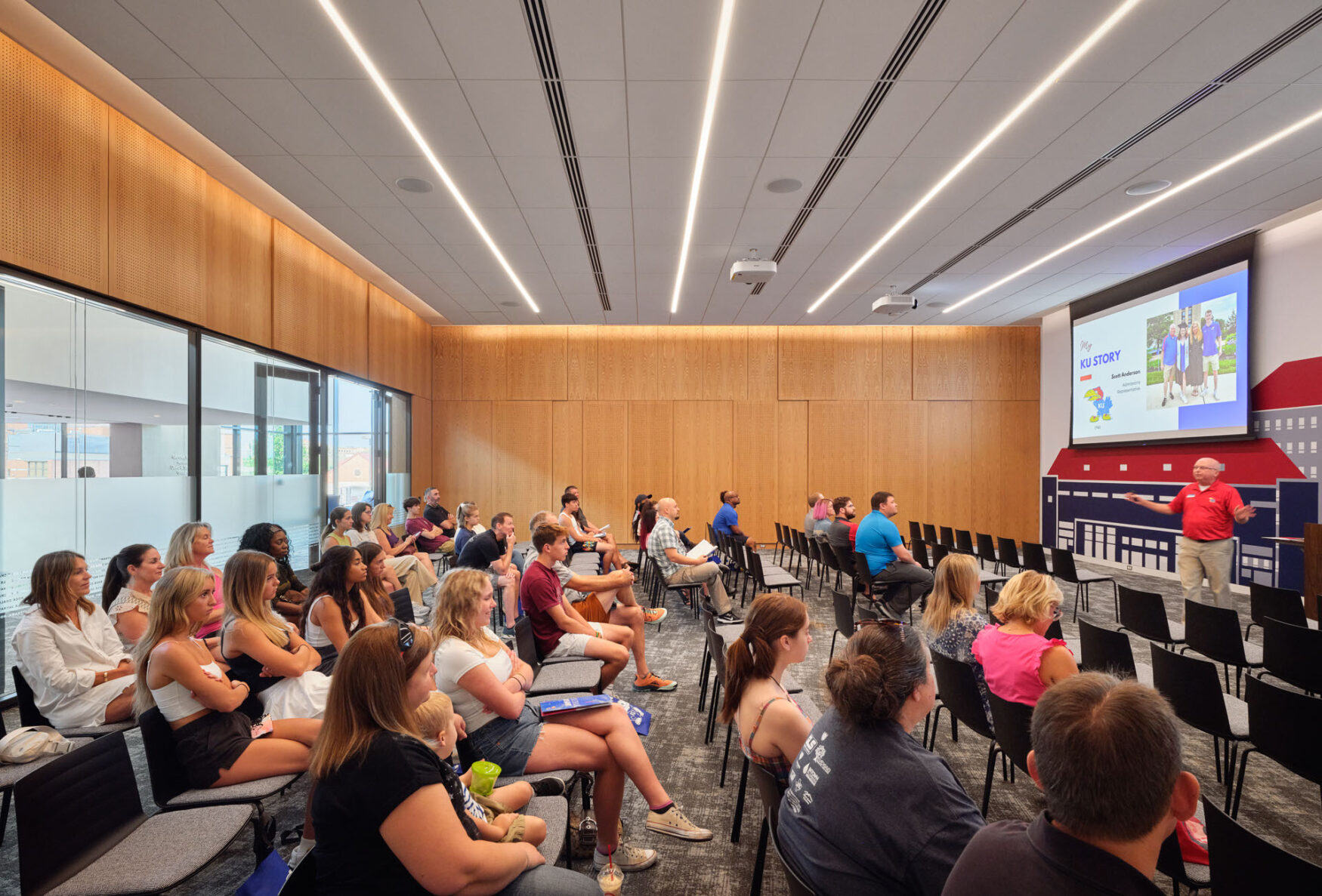 students paying attention to a presentation in the KU Welcome Center