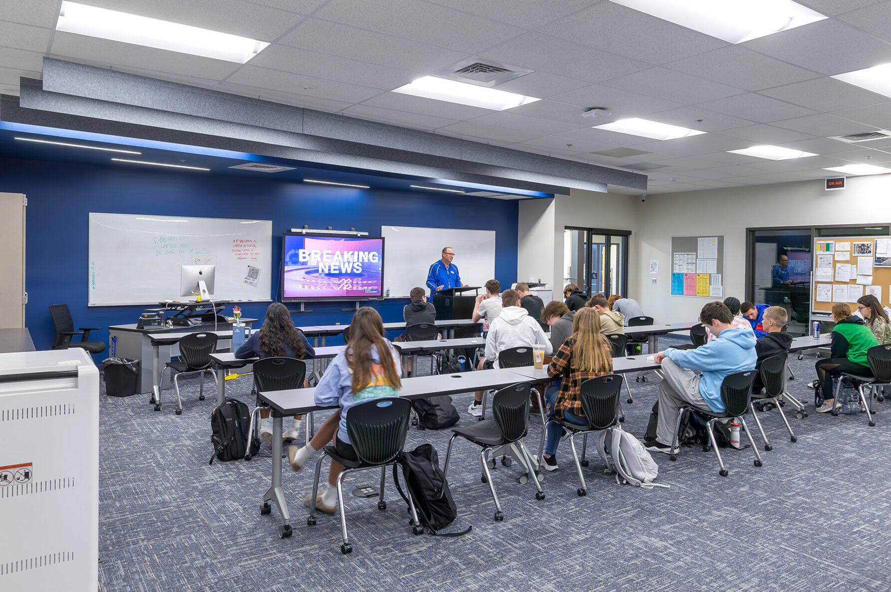 teacher teaching a class in a classroom atat Auburn Washburn High School