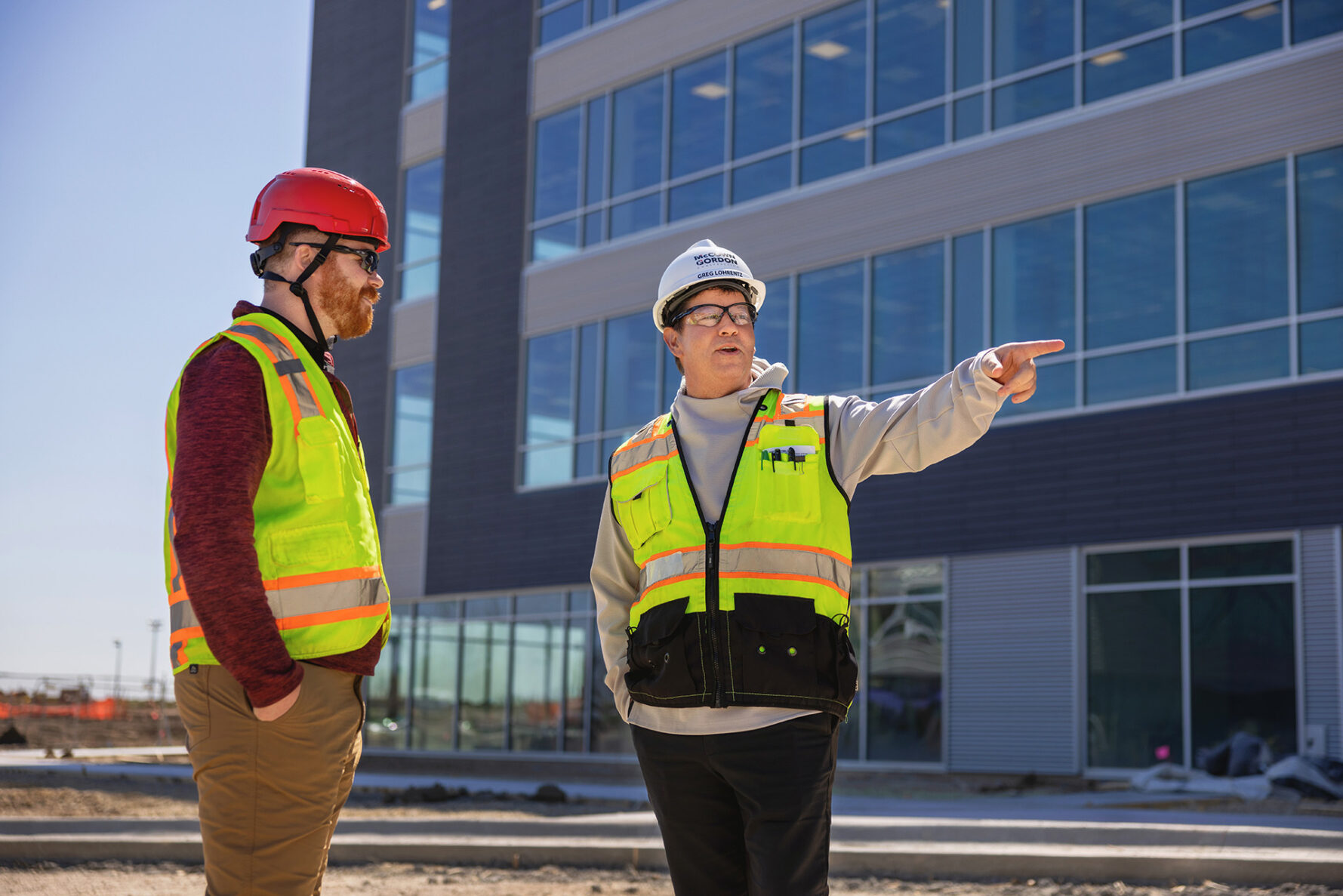 McCownGordon Construction associate talking with an owner on a jobsite in Manhattan, Kansas