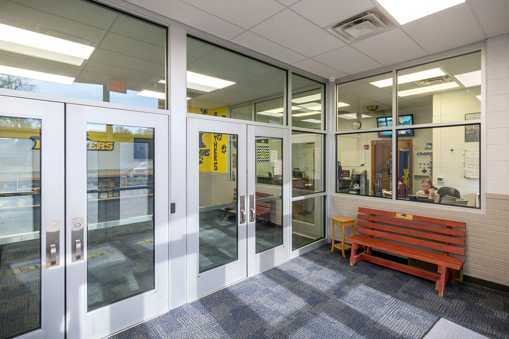 updated entryway with a bench at Nickerson High School