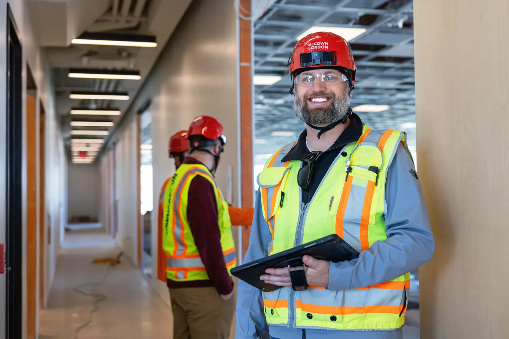 McCownGordon workers smiling on jobsite.