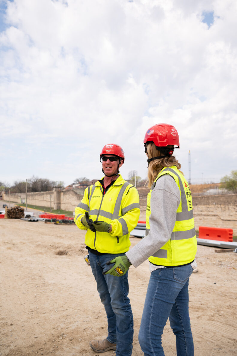 McCownGordon associates discuss job site.