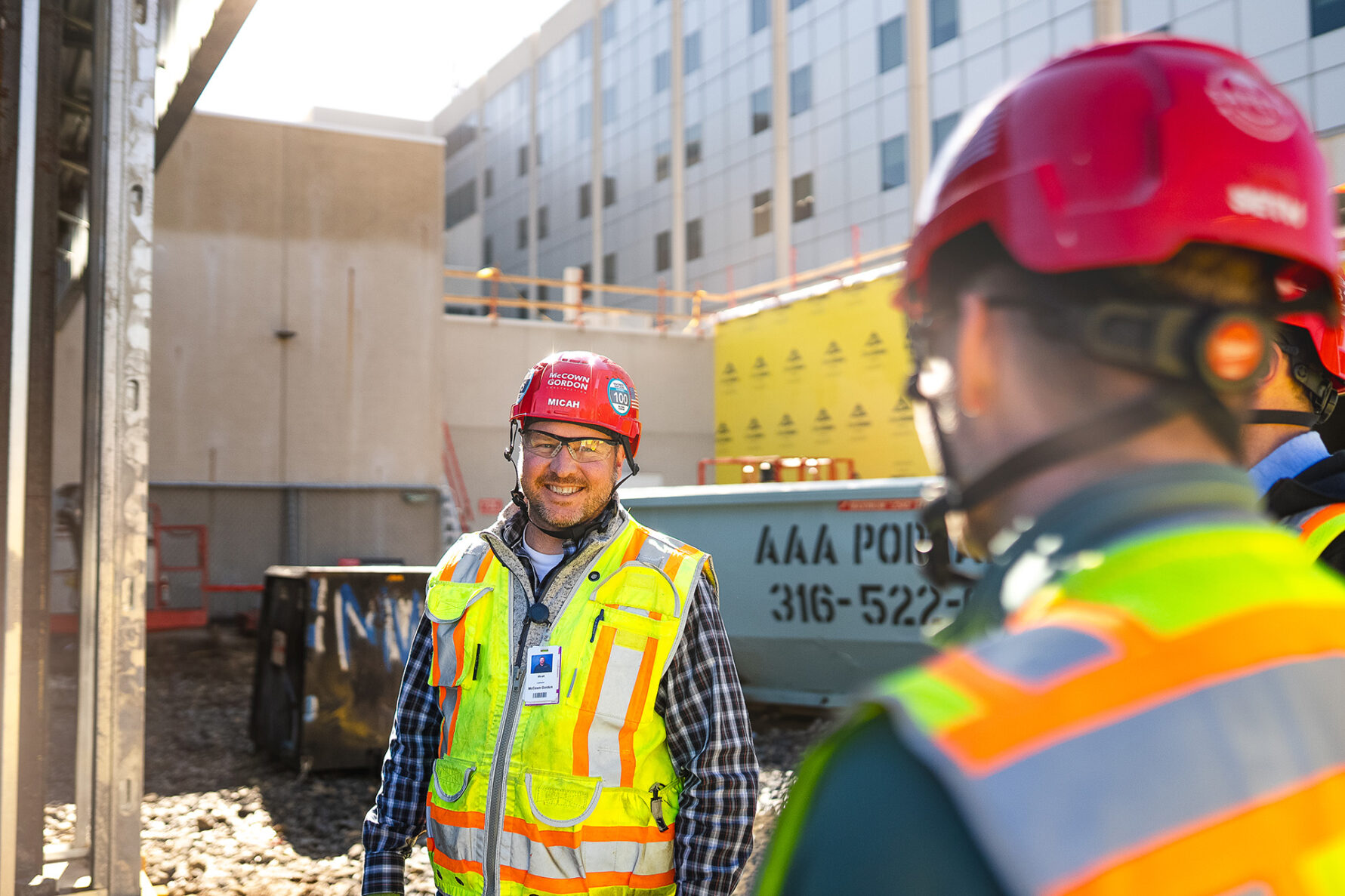 Two McCownGordon workers collaborating onsite.