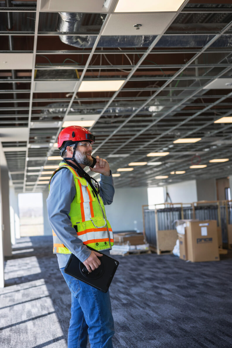 McCownGordon associates working on site using technology