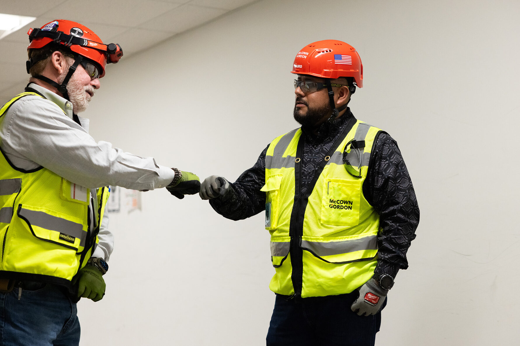 McCownGordon associate collaborating on jobsite.
