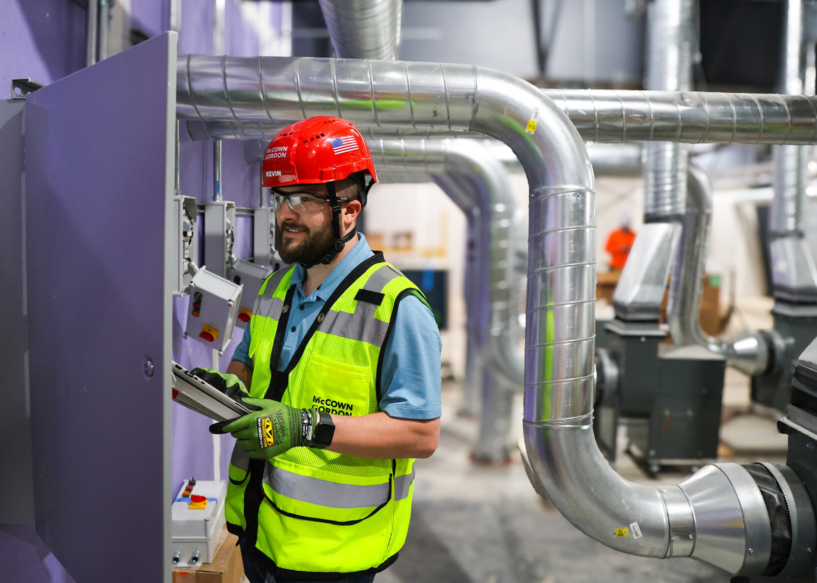McCownGordon associate performing equipment testing for commissioning services.